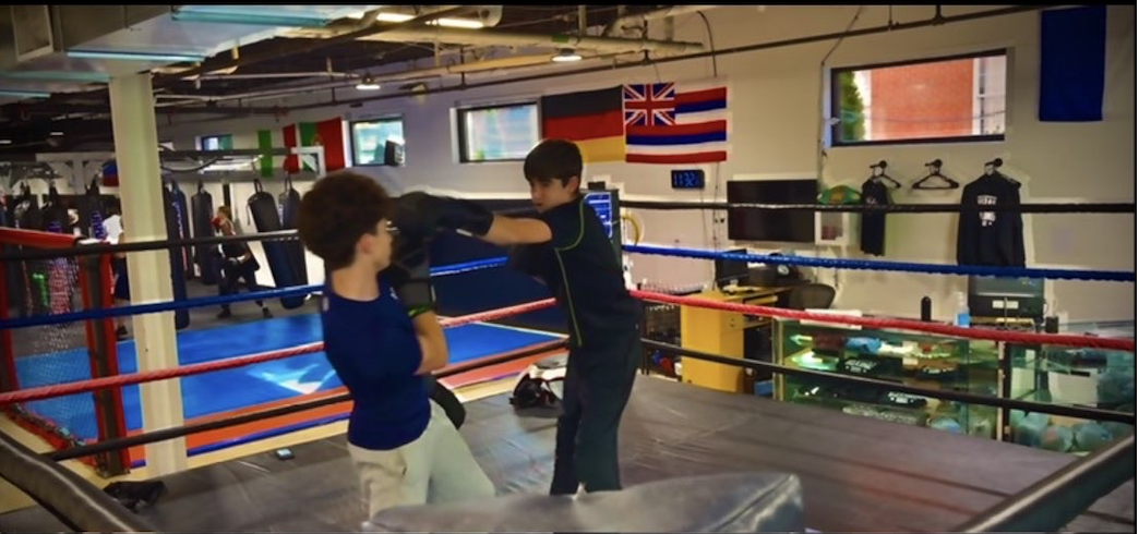 Sports outside of SJC: Andrew DeLuca '28 on balancing boxing and tennis