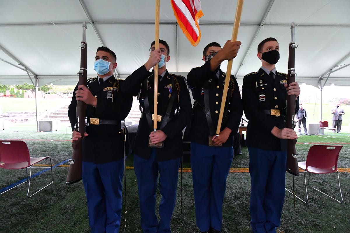 The Cadet Corps celebrate a socially distant Sabre Ceremony