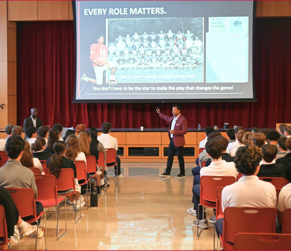 Dr. Michael Wright '90 and Super Bowl champ Vernon Davis meet with SJC students to discuss entrepreneurship and making a difference