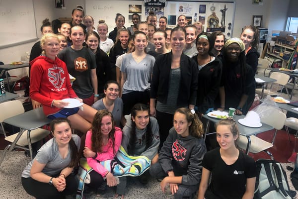 Dietician talks with girls' cross country about being healthy athletes