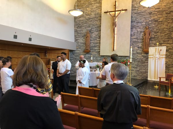 SJC seniors initiated into Catholic Church